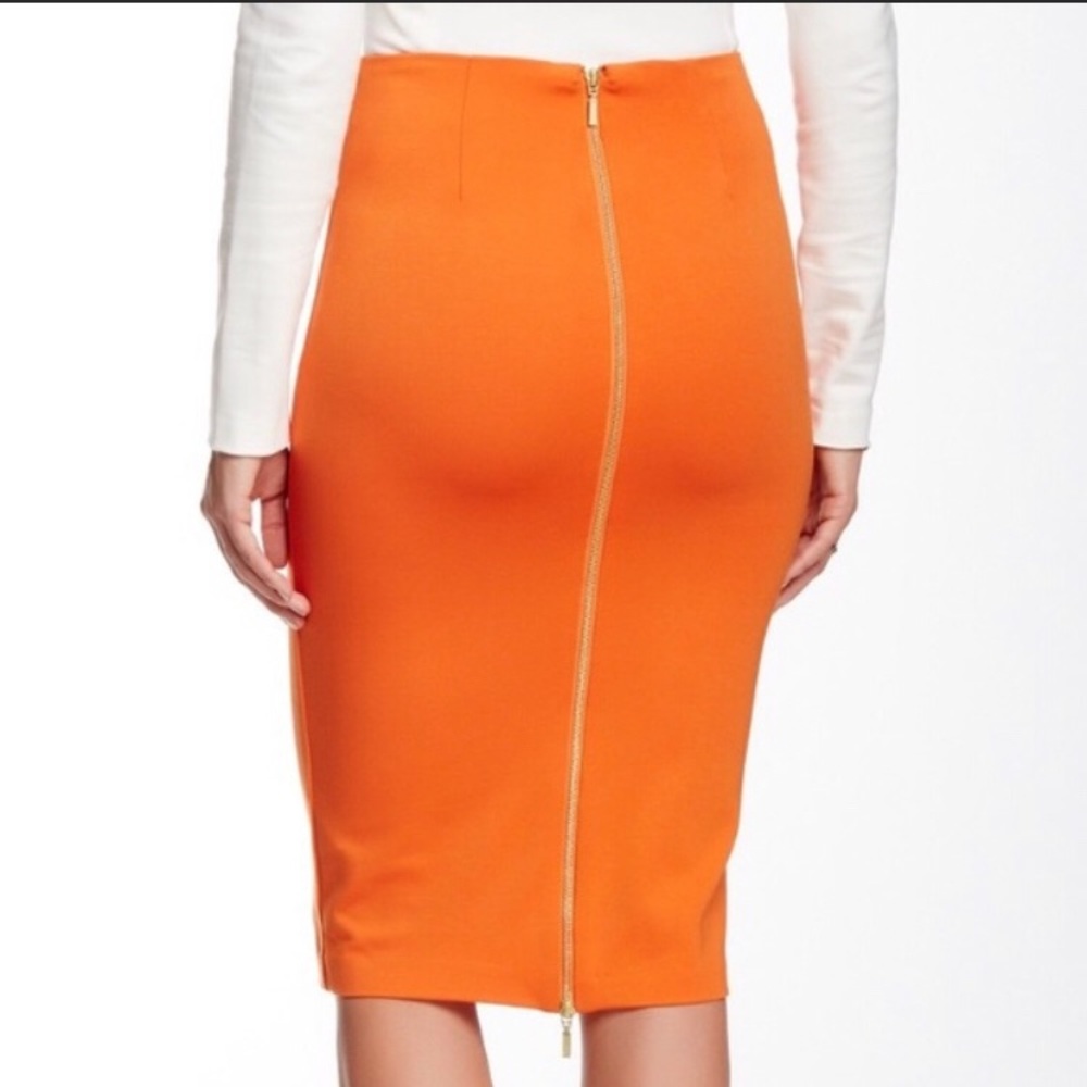 Orange midi skirt with zip back. New with tags 🔥